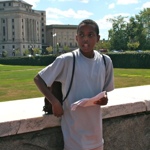 Malik talking about John Gordon near the corner of Francis and Smith Streets.